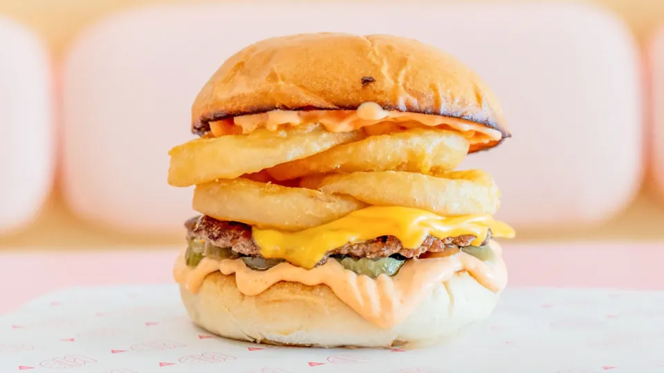 Hot Stuff – Smashed patty, cheese, sriracha mayo, jalapeños, onion rings + spicy pickles.