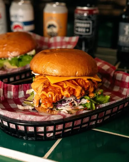Crispy Chic burger in a red gingham basket