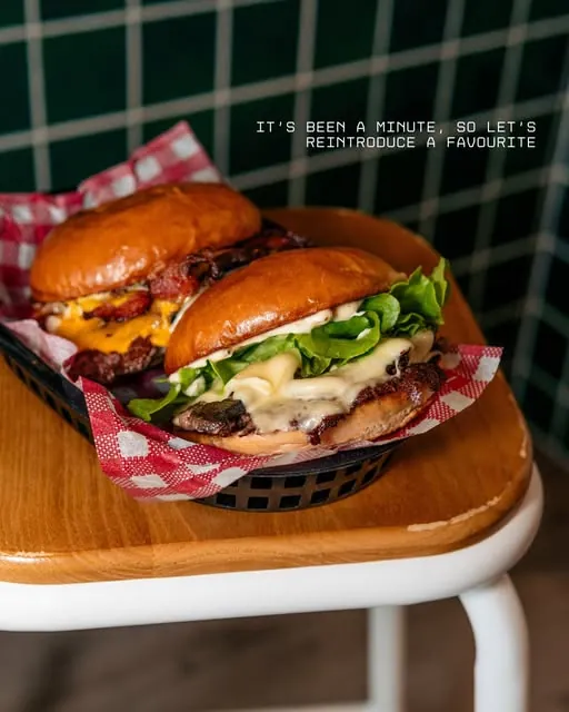 Loaded burger basket on a timber stool